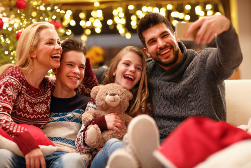 selfie with smiling family on Christmas holiday